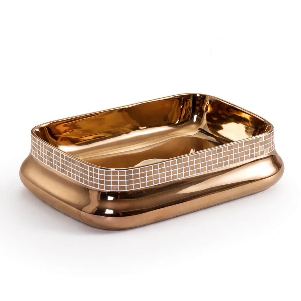 Gold-colored soap dish with mosaic pattern on a white background